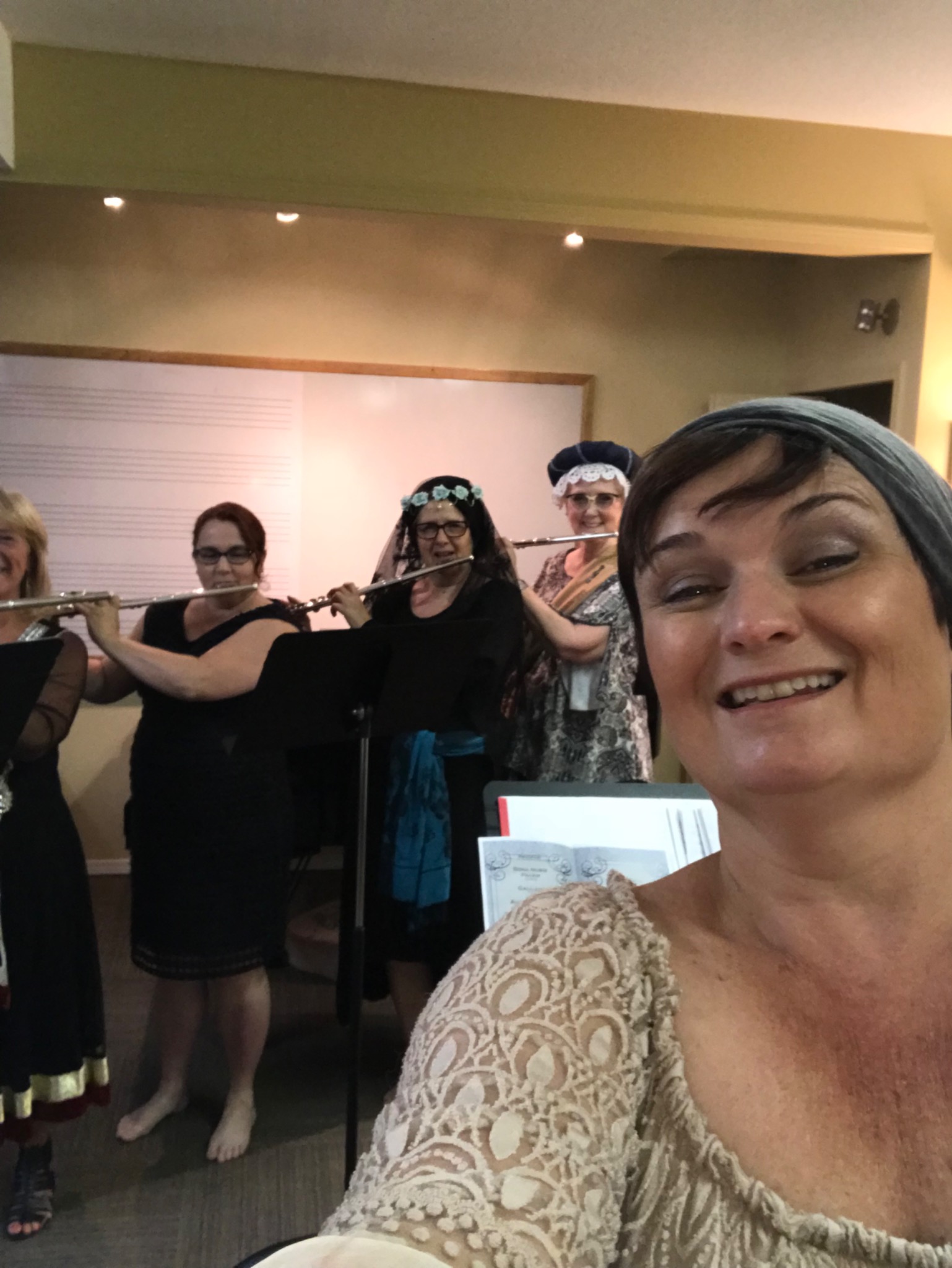 A joyful costumed flute ensemble